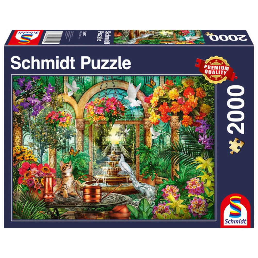 Schmidt Spiele Atrium puzzle box features a vibrant garden scene with colorful flowers, a bird, a cat, and a flowing fountain
