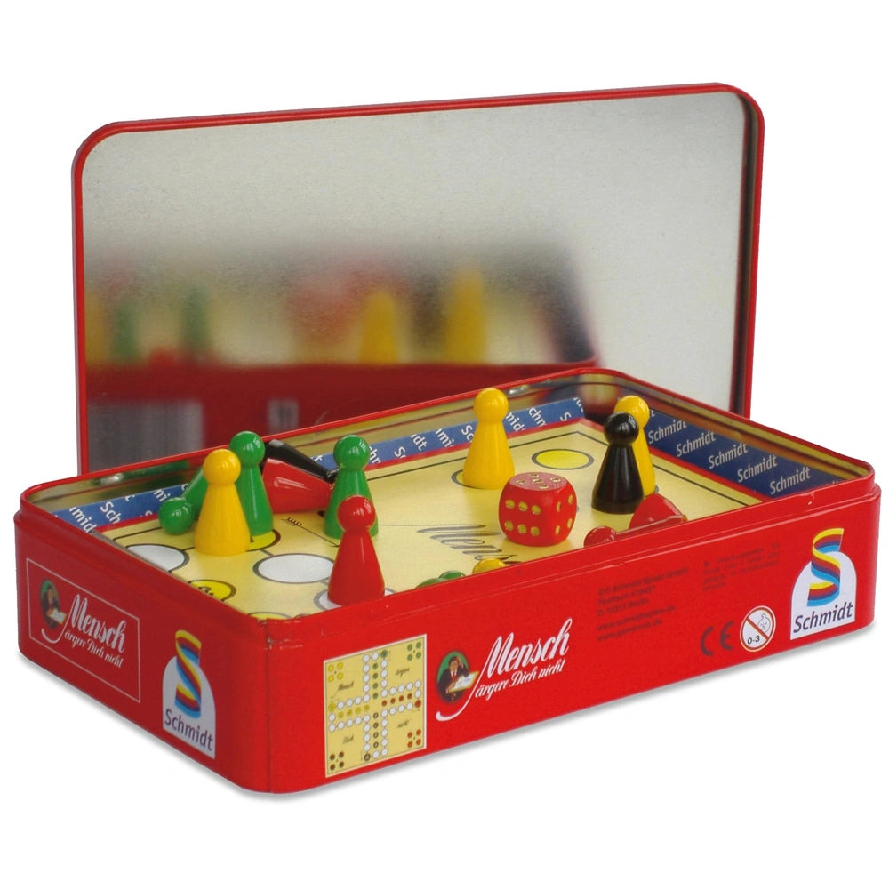 Schmidt Spiele's "Don't Bother Me" features a colorful game board and pieces inside a shiny red toy box with a clear lid.