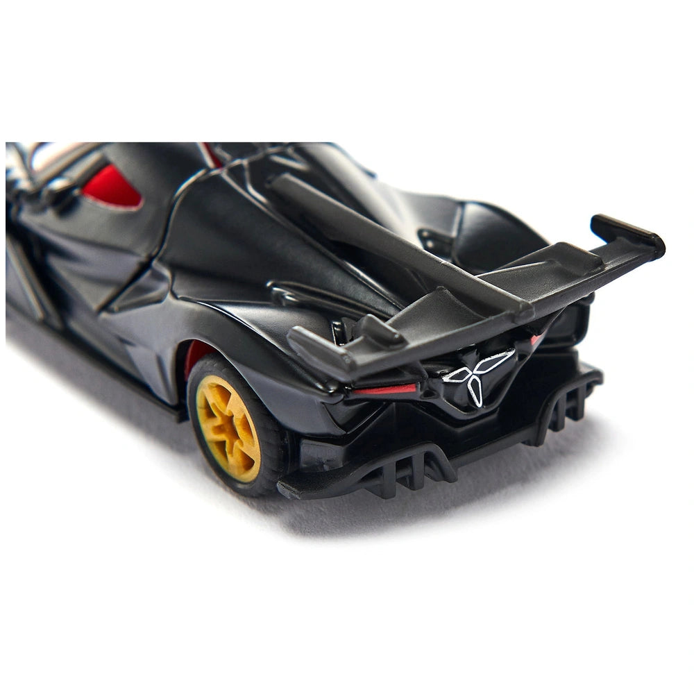 Black toy sports car with red and yellow wheels, featuring a sleek design and prominent spoiler for racing aesthetics.