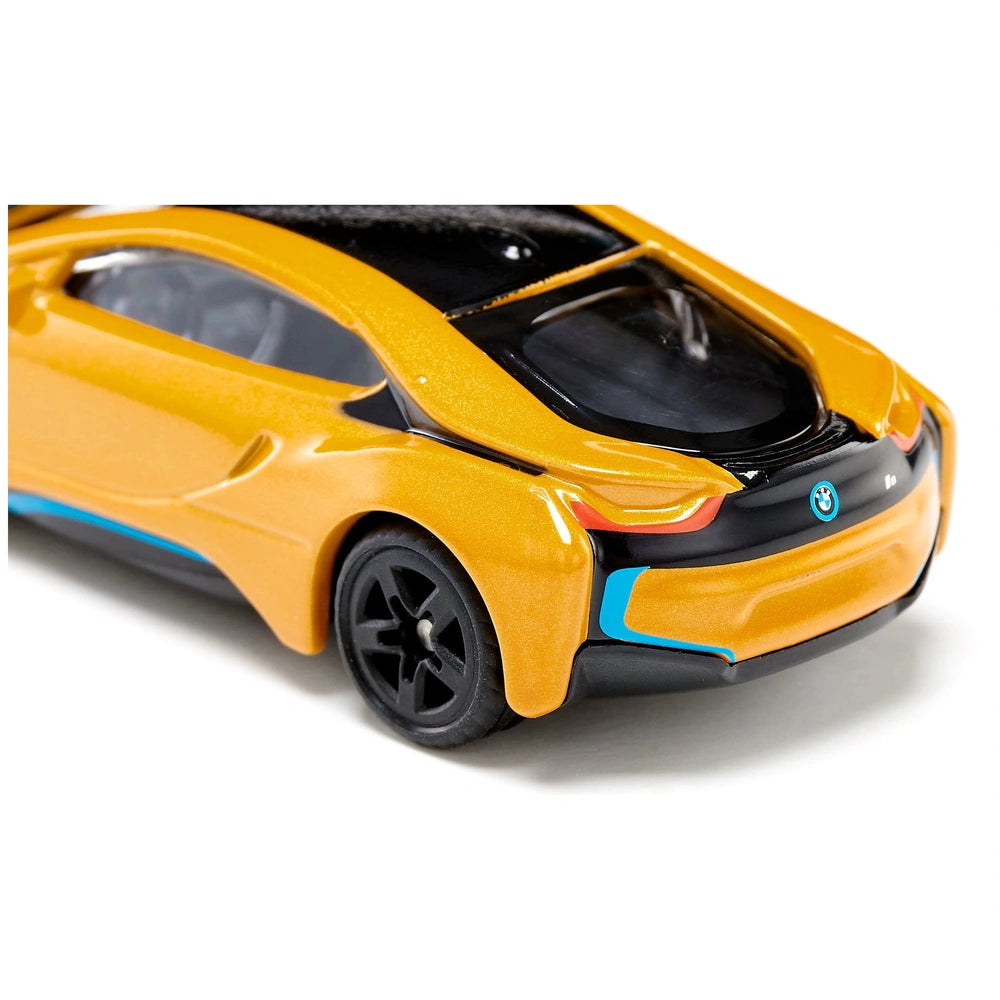 Siku BMW I8 toy car features a glossy yellow body with black accents and a blue stripe along the side.