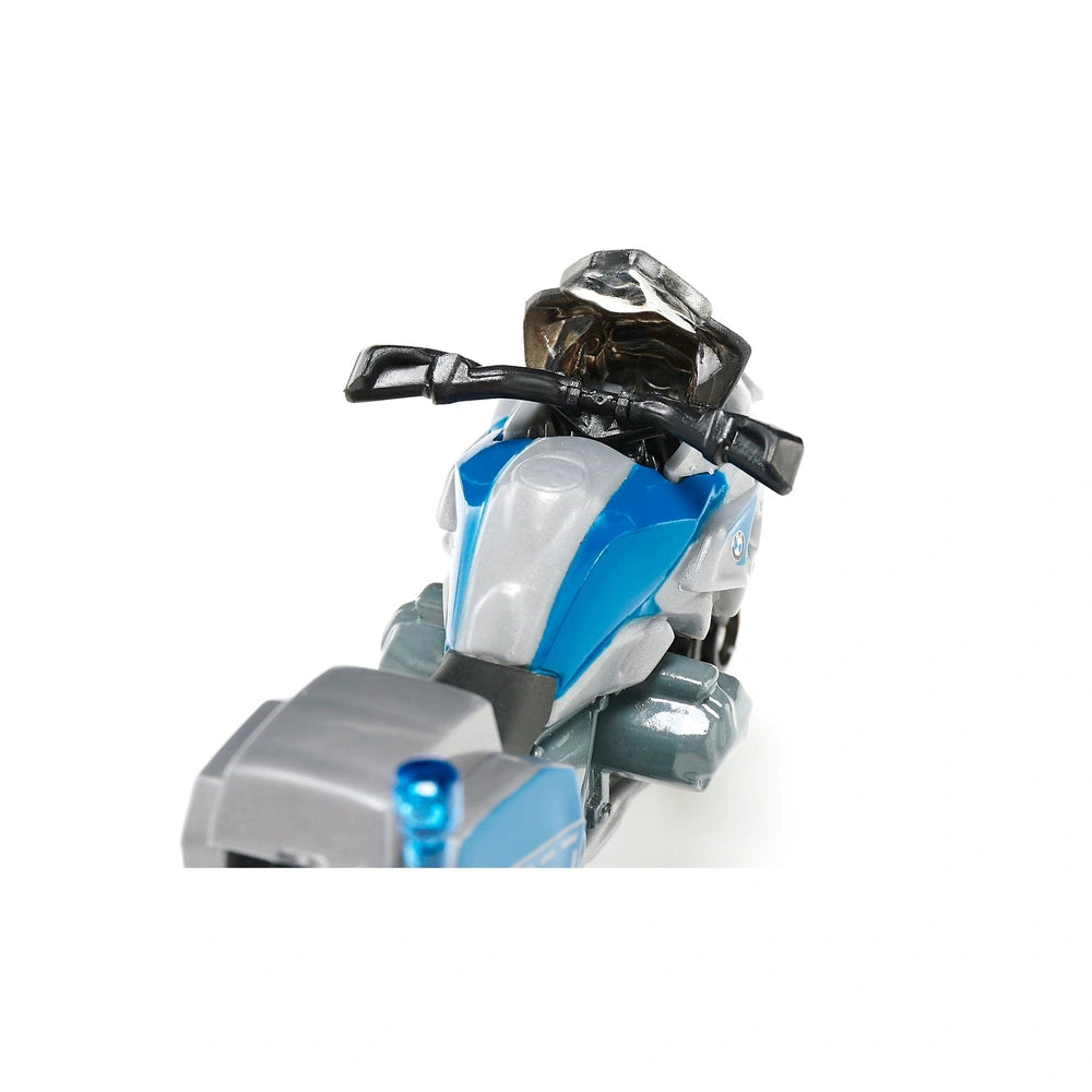 Siku BMW police motorbike toy features a glossy blue and white design with a black handlebar and a blue front light.