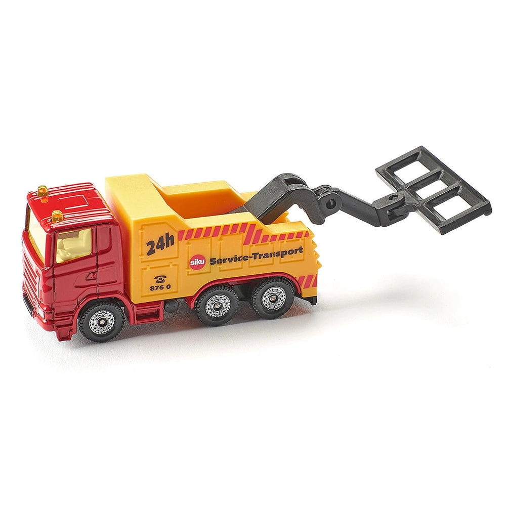 Red toy breakdown truck with a yellow crane, featuring black wheels and glossy surfaces, labeled "24h Service-Transport."