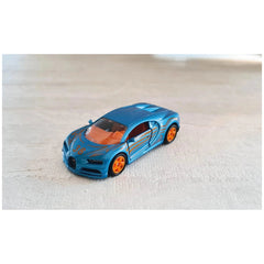 Siku Bugatti Chiron toy car features a blue body with orange accents and a black roof, placed on a light-colored surface.