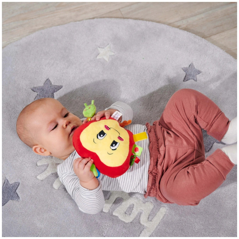 Simba ABC Activities Apple with Caterpillar Cuddle plush toy in a cozy play area with a calm baby.