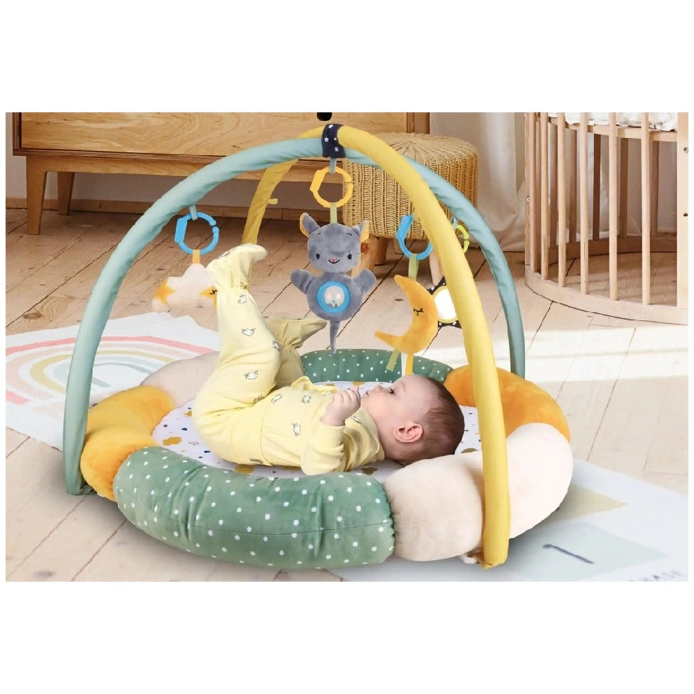 Teorema GoGO Soft Play Gym features a baby on a colorful mat with hanging toys in a warm, inviting indoor play area.