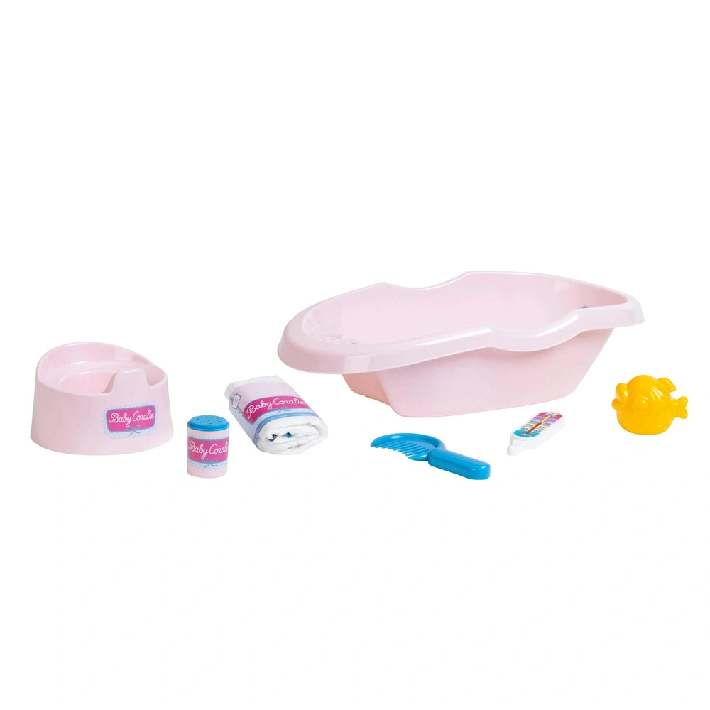 Theo Klein Baby Coralie bathtub set features a pink toothbrush holder, blue toothbrush, and white toothpaste in a plastic con