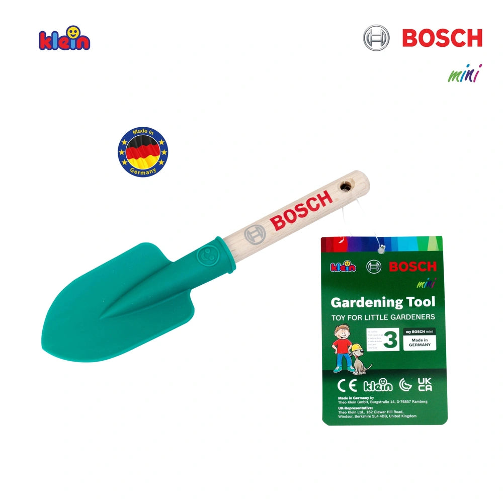 Theo Klein Bosch garden hand shovel with green plastic handle, blue scoop, and wooden handle on green packaging.