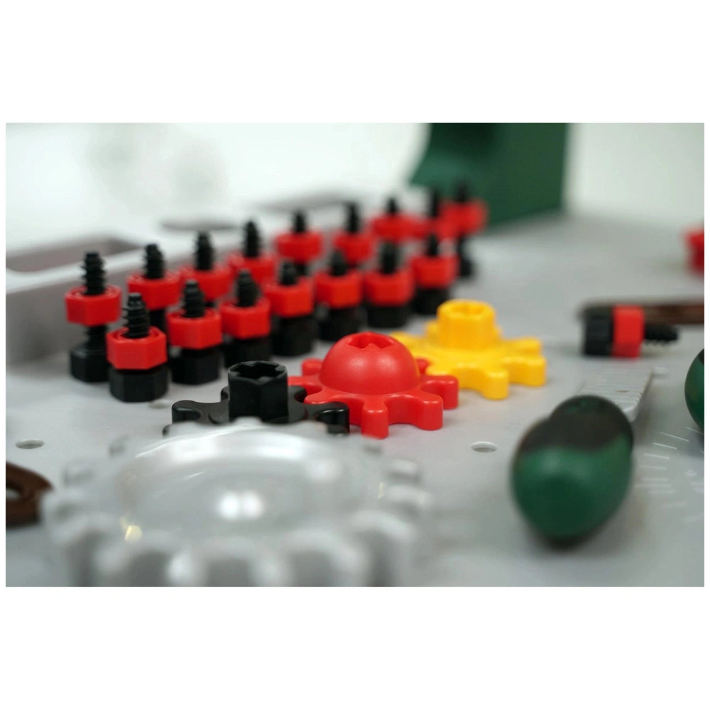Theo Klein Bosch workbench with 77 plastic and metal components in red, yellow, and green, featuring a matte and shiny finish