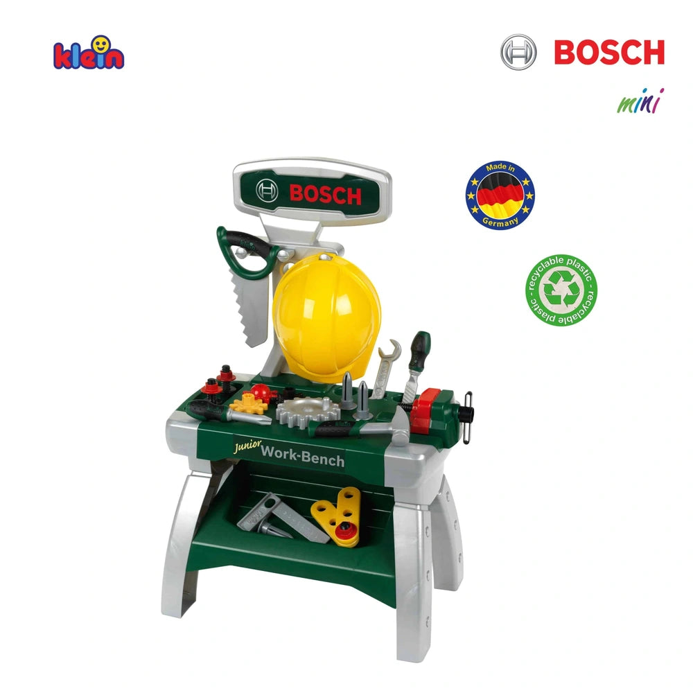Theo Klein Bosch Workbench Junior in green with yellow head, red handle, black screwdriver, and silver metal clamps.