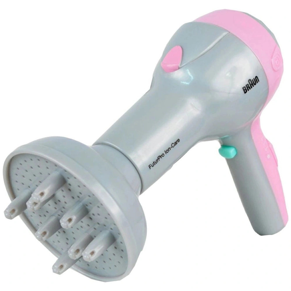 Theo Klein Braun hairdryer with pink nozzle, gray body, trigger handle, and green button for pretend play.