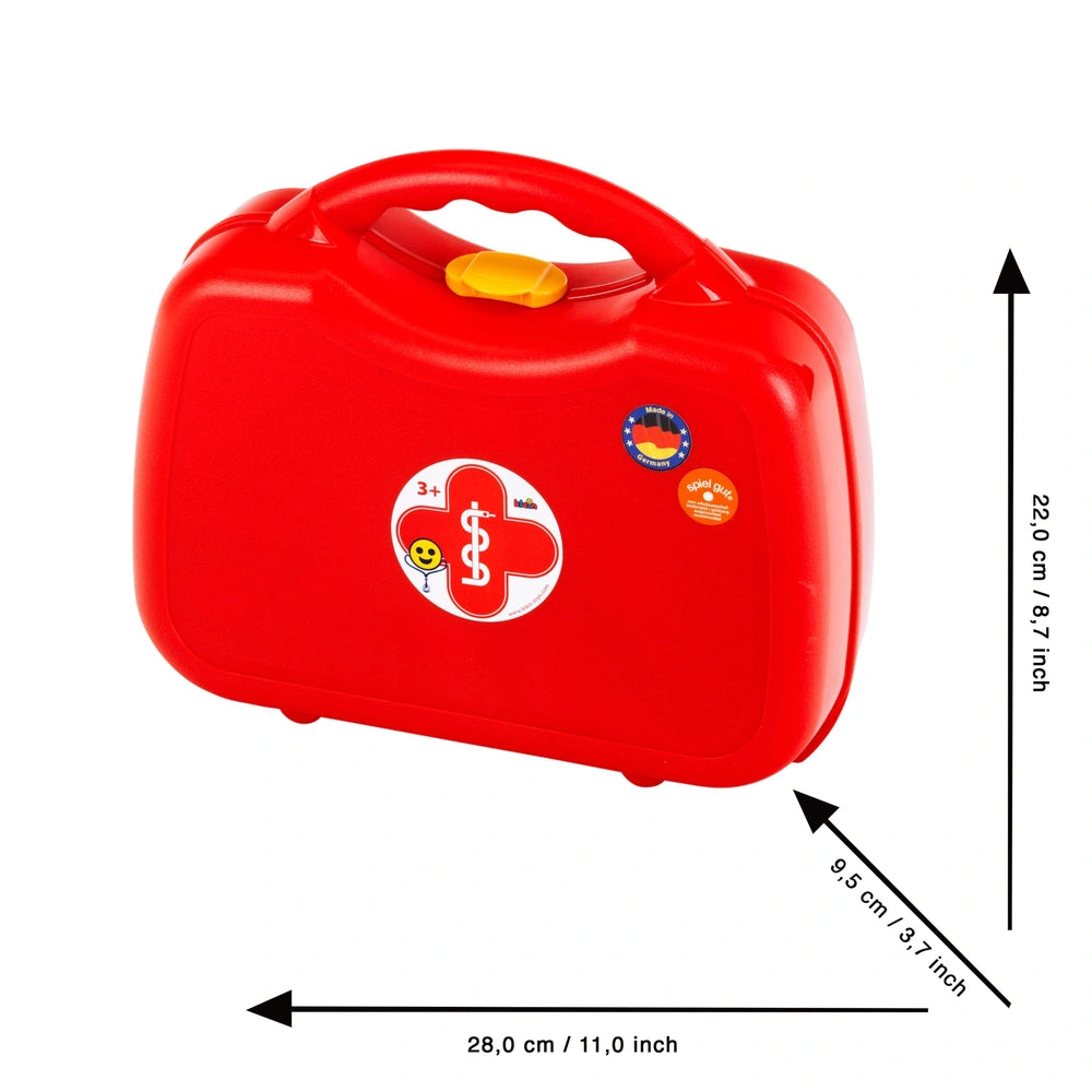 Theo Klein Doctor Case featuring a red plastic container with a yellow lid and various colorful stickers and symbols.