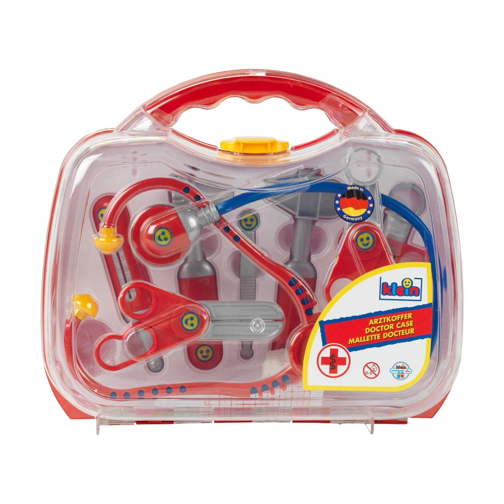 Theo Klein Doctor Case with red handle and colorful plastic components in transparent retail packaging.