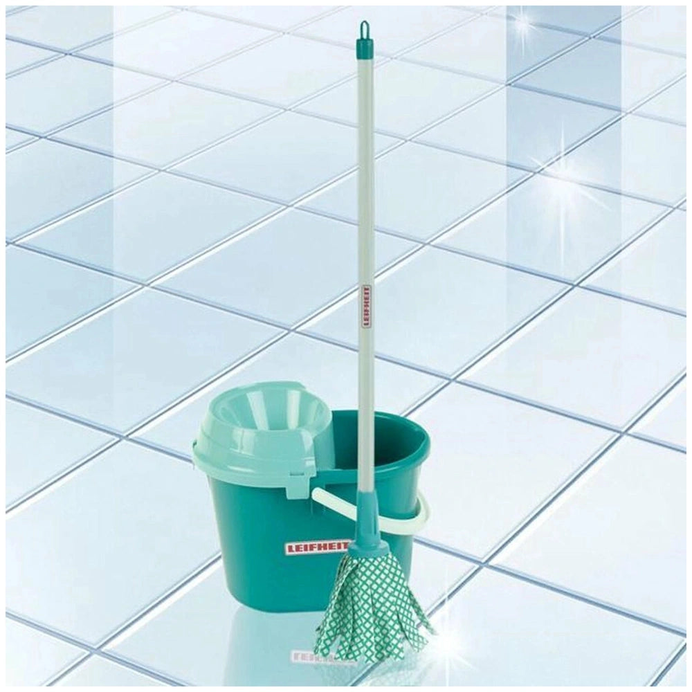 Theo Klein Mop Set features a blue plastic bucket, white and blue mop handle, and green fabric mop head on tiled floor.