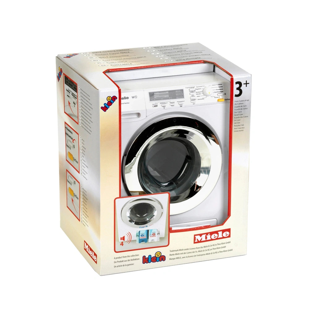 Theo Klein Miele washing machine toy in red and white cardboard packaging with black, silver, and blue details.